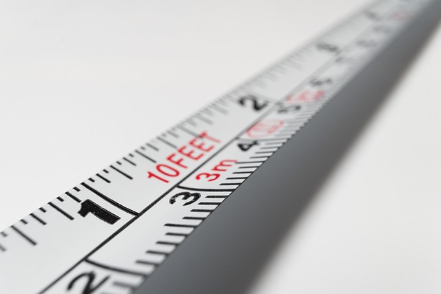 Measuring tape with millimetre, centimetre and inch markings